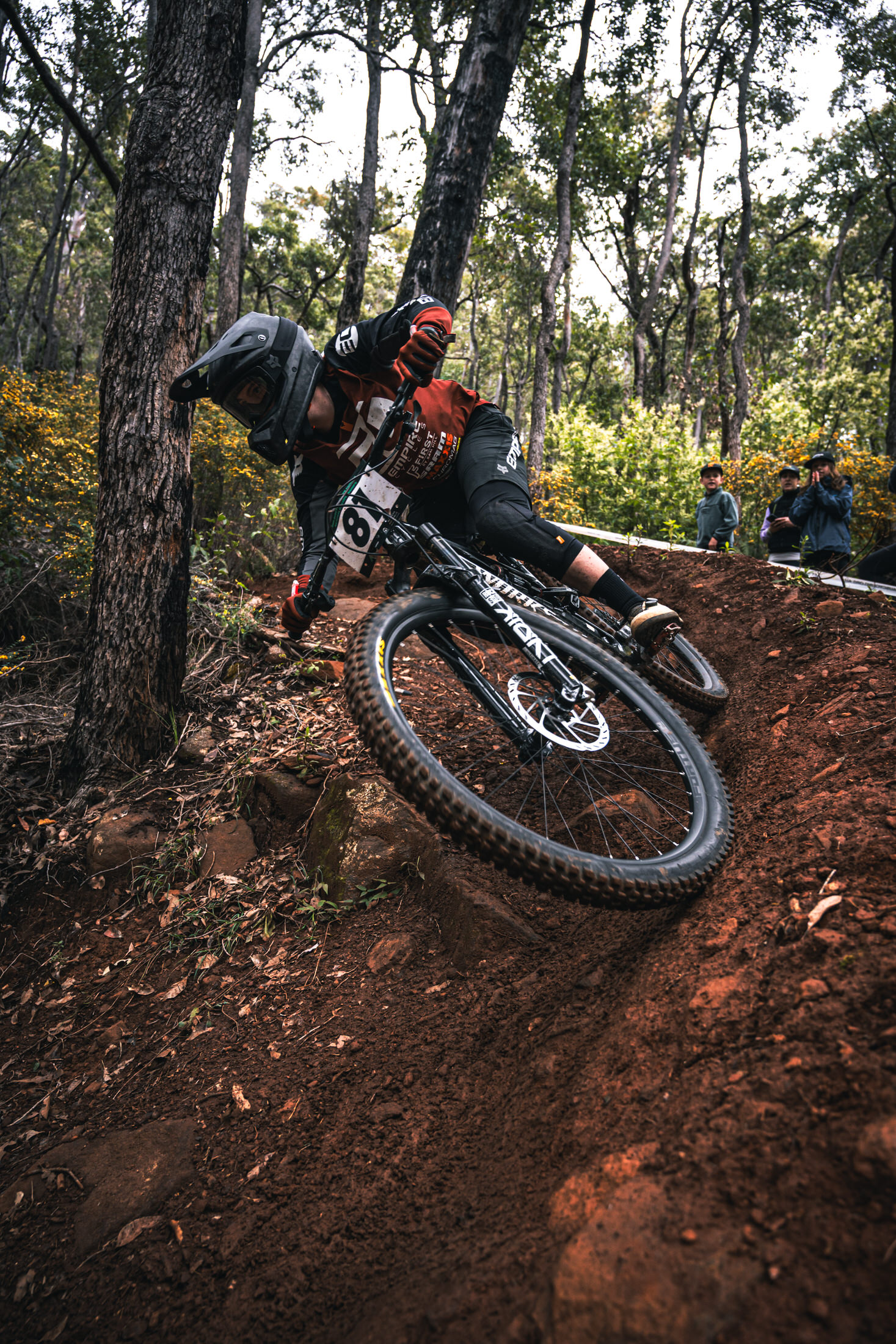 A racer riding through a bermed corner at the AusCycling Enduro National Championships in Collie,